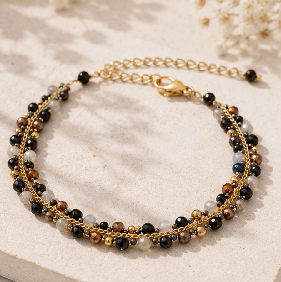 Preview: Armband Mayari – Edelstahl mit facettierten Glasperlen in Schwarz und Gold