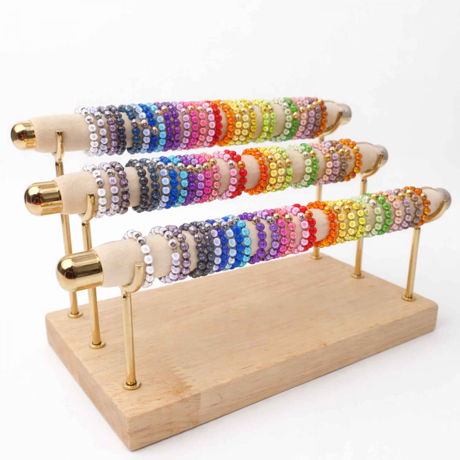 Display mit 75 Wonderperlen Ringen auf Gummi – Größen S, M, L